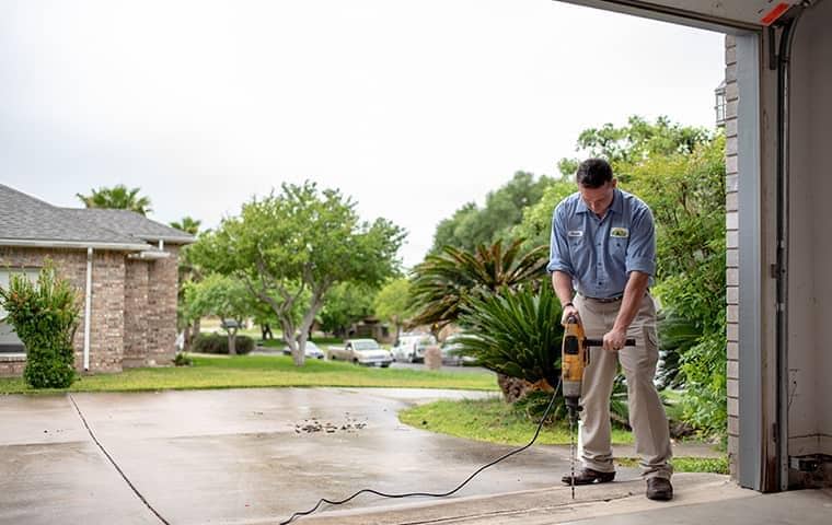 Technician drilling floor