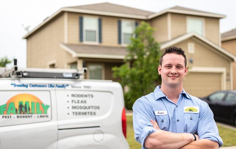 man standing in front of a house