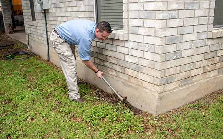 man inspecting a home